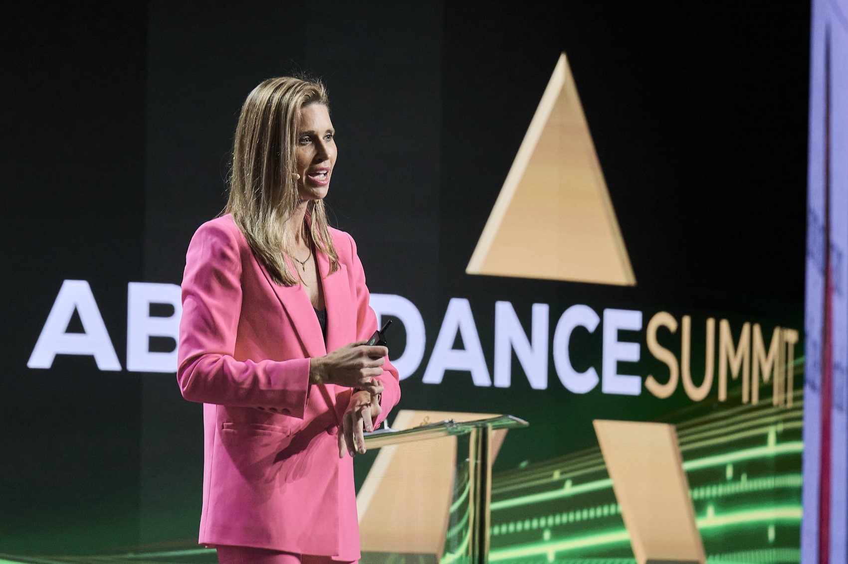 Dr. Amy Killen, MD delivering a keynote at Abundance Summit